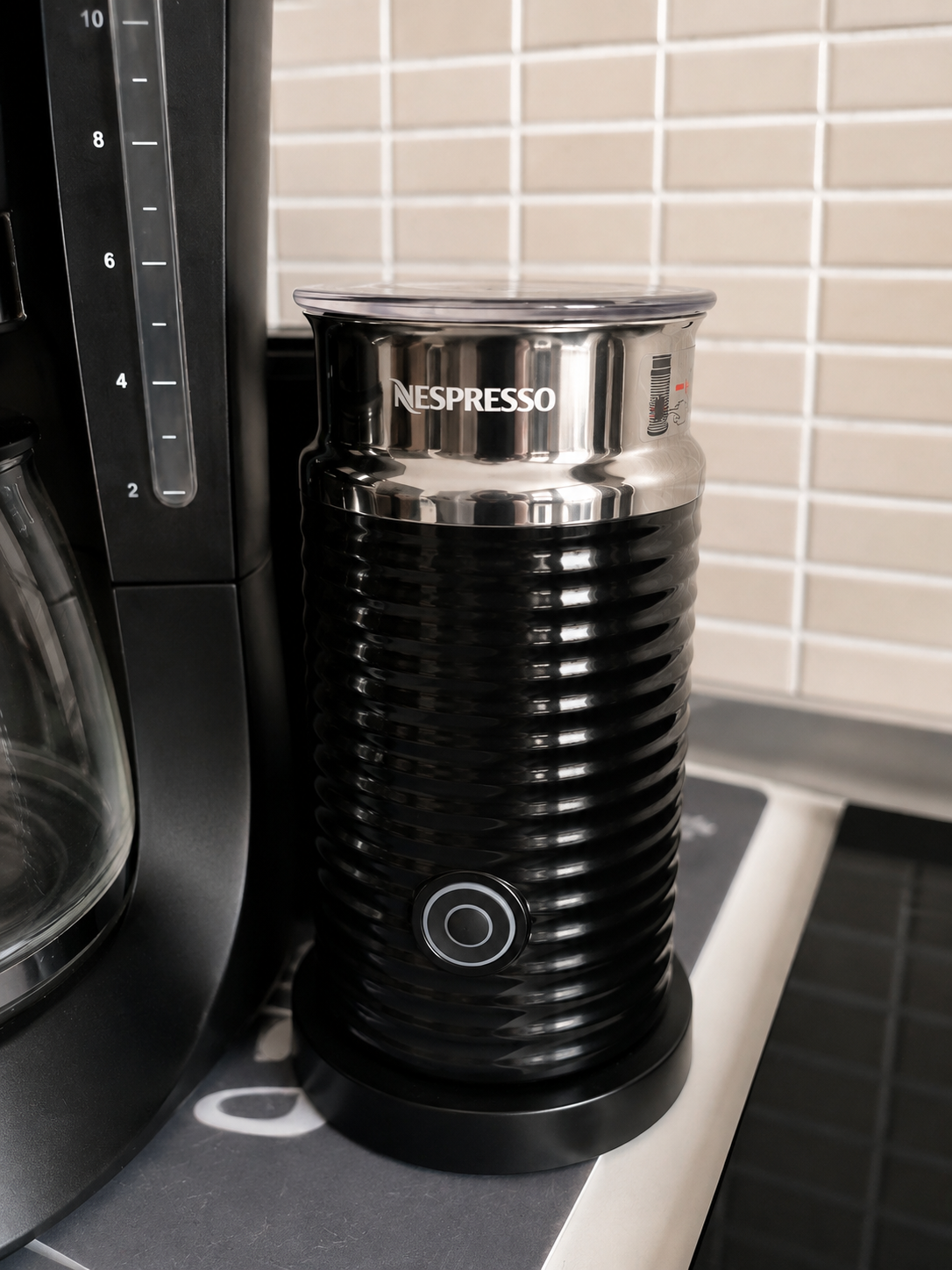 Nespresso Aeroccino milk frother beside the filter coffee machine